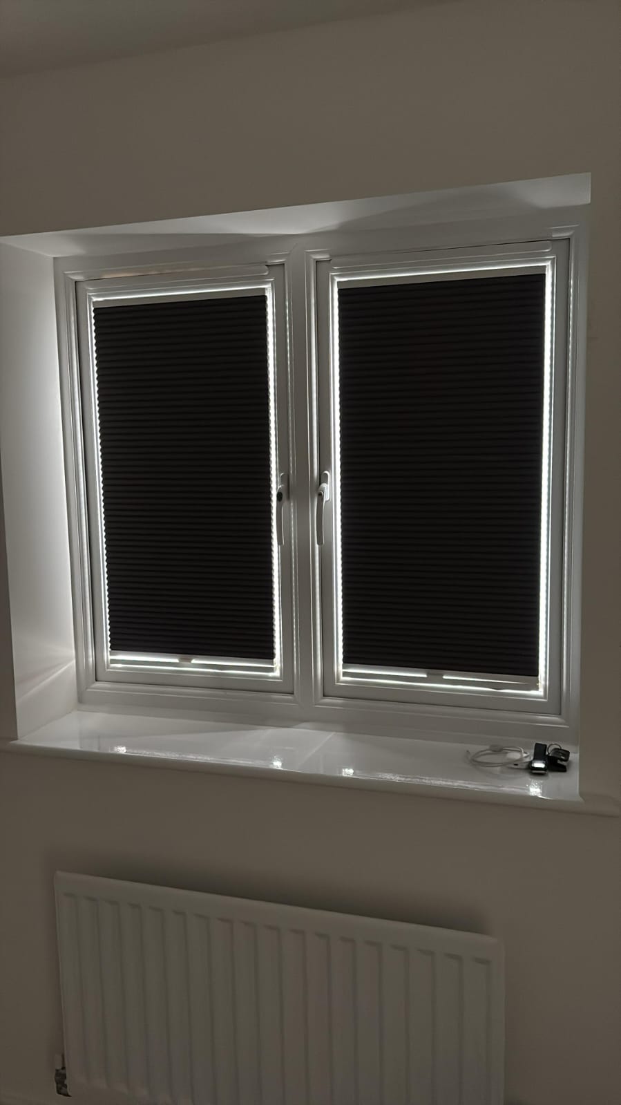 Shires Shutters installation, real blackout pleated charcoal