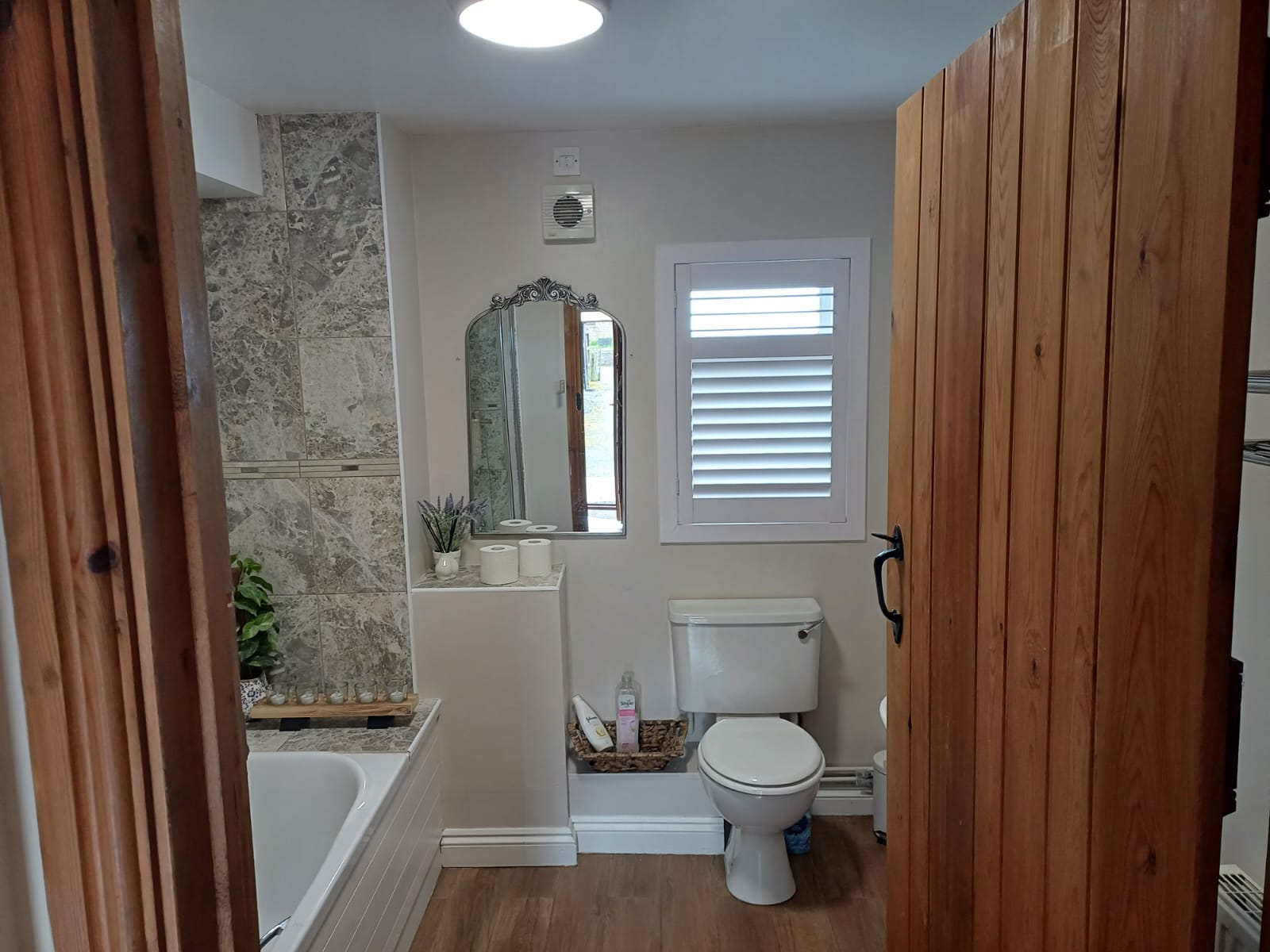 Shires Shutters installation, real shutter small bathroom