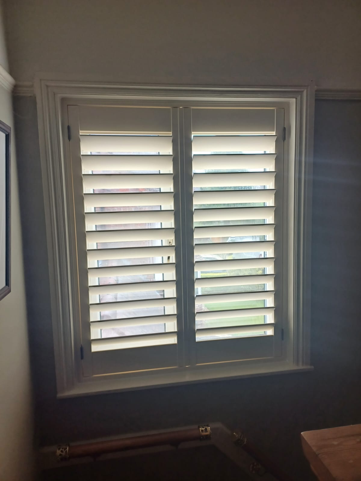 Shires Shutters installation, real shutter tall window grey