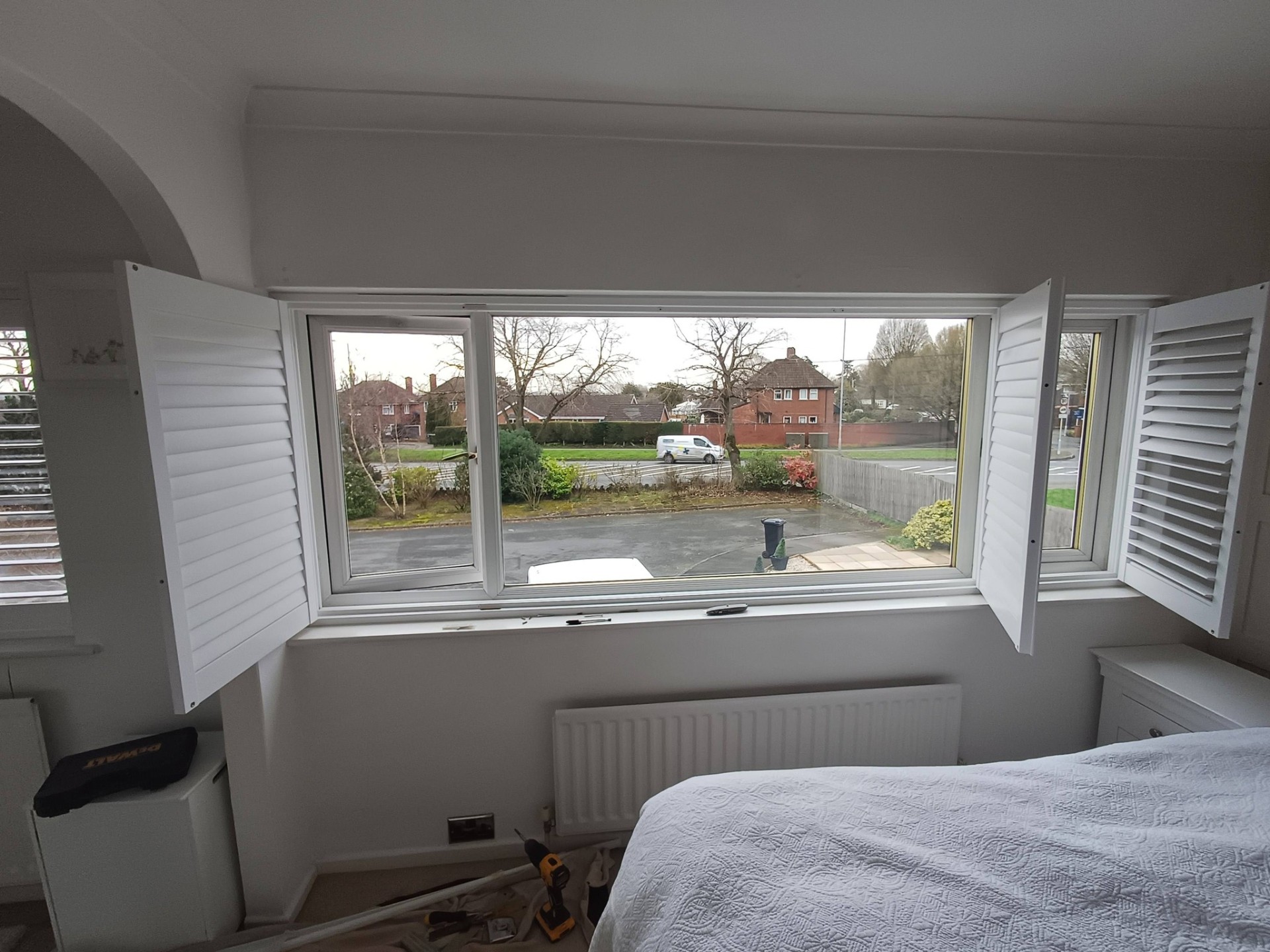 Shires Shutters installation, shutter bedroom open panels