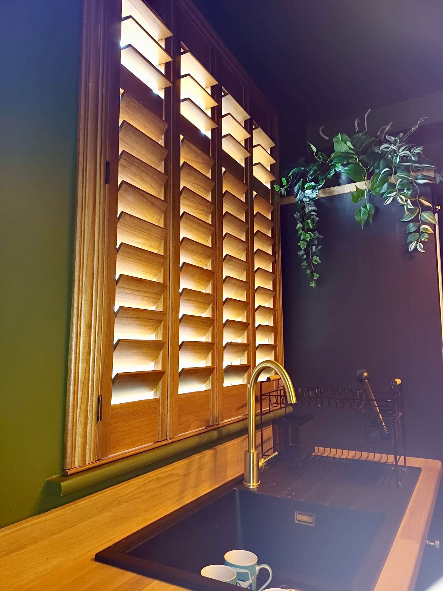 Close-up of a bespoke hardwood plantation shutter installed by Shires
